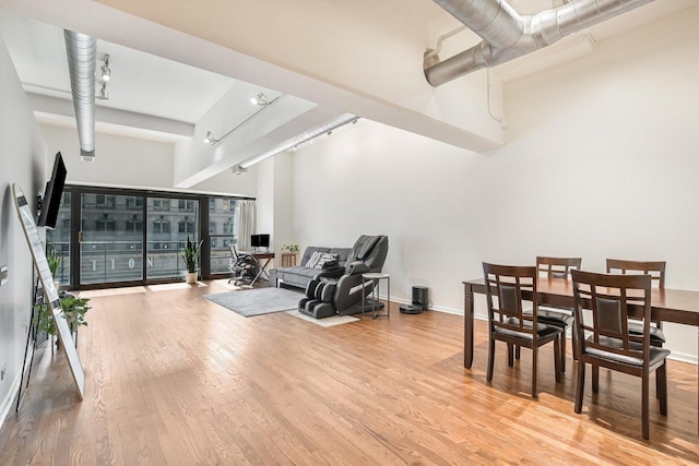 130 S Canal St Unit 624, Chicago, IL 60606 - dining area with a high ceiling and wood finished floors