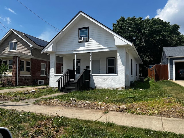 956 2nd Ave, Aurora, IL 60505 - bungalow-style home featuring brick siding and covered porch