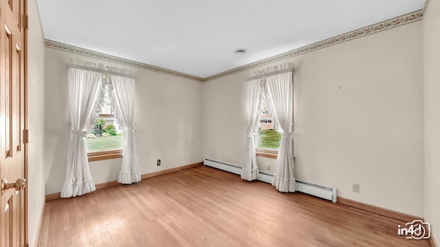74 Wilmette Dr, Oswego, IL 60543 - spare room with healthy amount of natural light and light wood-type flooring