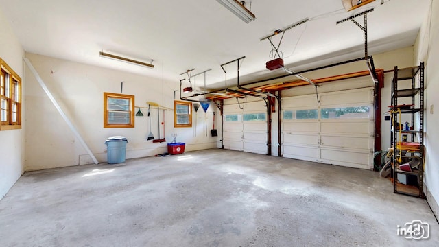 74 Wilmette Dr, Oswego, IL 60543 - garage with a garage door opener
