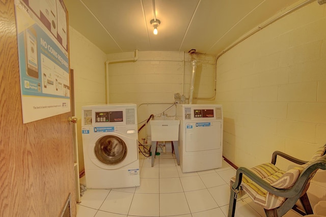 3959 W 104th St Unit 1-A, Chicago, IL 60655 - shared laundry featuring separate washer and dryer, concrete block wall, and tile patterned flooring