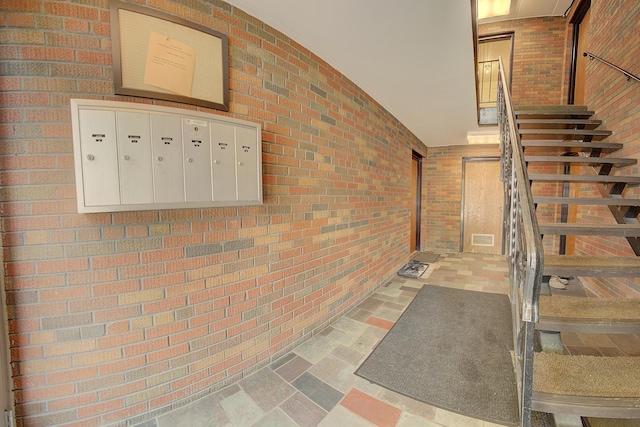 3959 W 104th St Unit 1-A, Chicago, IL 60655 - stairs featuring mail area and brick wall