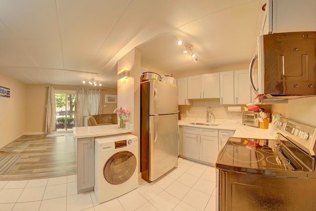3959 W 104th St Unit 1-A, Chicago, IL 60655 - kitchen featuring stainless steel appliances, washer / dryer, open floor plan, light tile patterned floors, and light stone counters