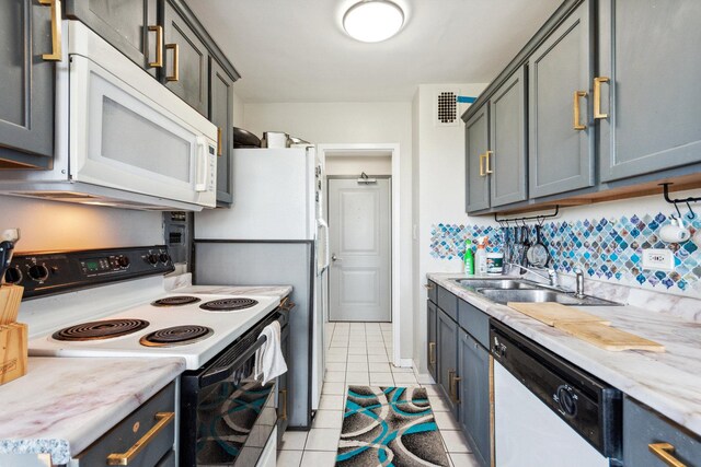 3410 N Lake Shore Dr Unit 5E, Chicago, IL 60657 - kitchen with white appliances, light tile patterned flooring, light countertops, and tasteful backsplash