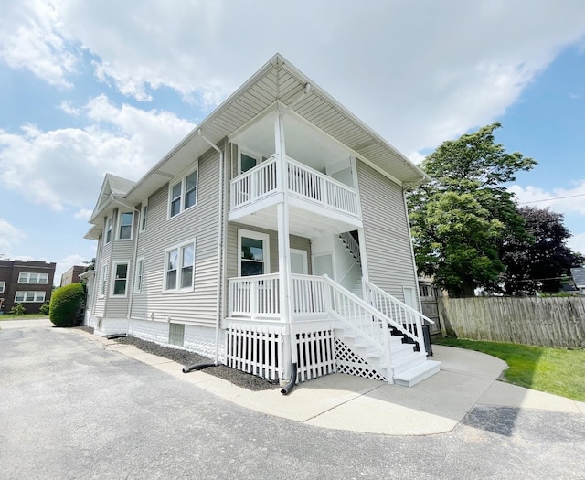 1509 Saint Charles Rd, Maywood, IL 60153 - view of front facade with a balcony