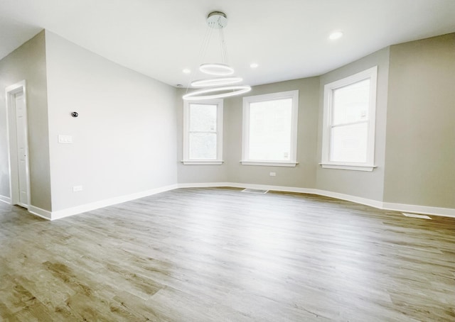 1509 Saint Charles Rd, Maywood, IL 60153 - empty room with wood finished floors, a chandelier, and recessed lighting