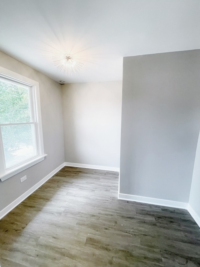 1509 Saint Charles Rd, Maywood, IL 60153 - empty room featuring wood finished floors and baseboards