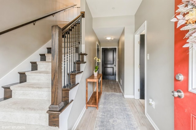 6825 179th St, Tinley Park, IL 60477 - entryway with light wood finished floors and stairs