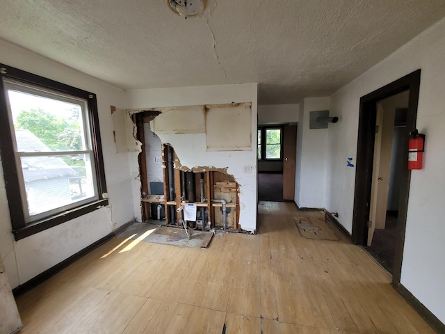 5307 S Emerald Ave, Chicago, IL 60609 - living area featuring light wood finished floors and a textured ceiling
