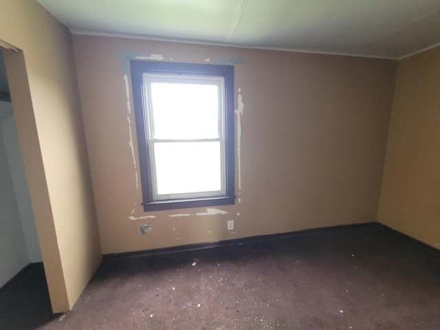 5307 S Emerald Ave, Chicago, IL 60609 - unfurnished room featuring crown molding and baseboards