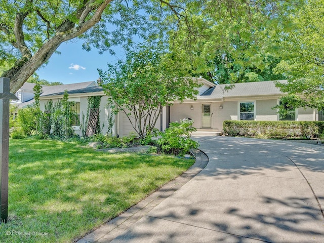 2246 Strawberry Ln, Glenview, IL 60026 - view of front of property with a front lawn and concrete driveway