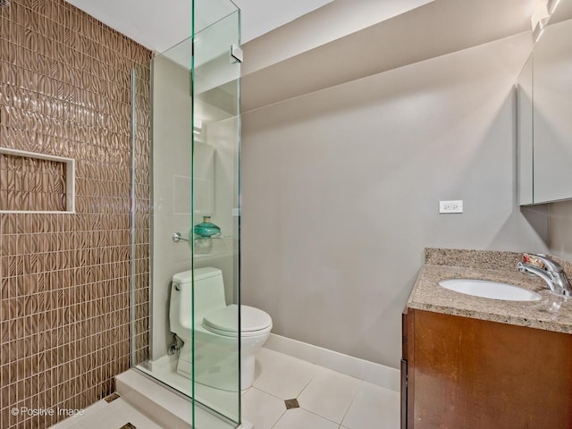 2246 Strawberry Ln, Glenview, IL 60026 - bathroom with vanity, a tile shower, and tile patterned floors