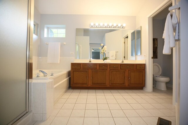 1061 Franklin St, Mundelein, IL 60060 - bathroom with a bath, double vanity, tile patterned floors, and a shower stall