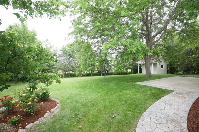 1061 Franklin St, Mundelein, IL 60060 - view of green lawn featuring an outbuilding
