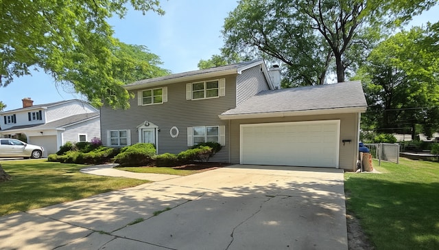 727 N Fordham Ave, Aurora, IL 60506 - colonial home with a garage, driveway, and a chimney