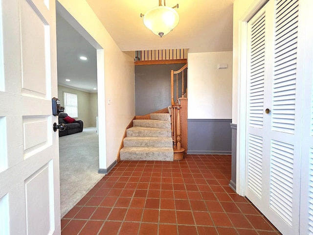 727 N Fordham Ave, Aurora, IL 60506 - entrance foyer featuring stairway, dark carpet, and dark tile patterned floors