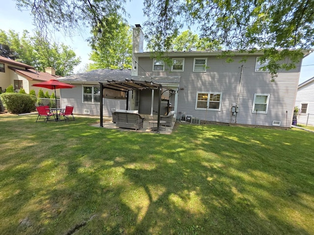 727 N Fordham Ave, Aurora, IL 60506 - back of property with a pergola, an outdoor hangout area, a chimney, a patio, and a lawn