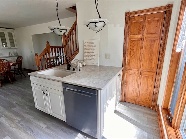1116 E 2300 N Rd, Danforth, IL 60930 - kitchen featuring stainless steel dishwasher, light wood-style flooring, white cabinets, and light stone counters