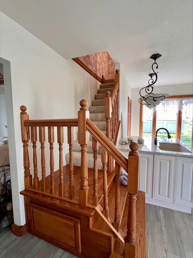1116 E 2300 N Rd, Danforth, IL 60930 - stairway featuring wood finished floors and a textured ceiling