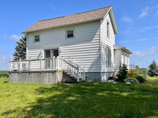 1116 E 2300 N Rd, Danforth, IL 60930 - rear view of property featuring a wooden deck, a lawn, roof with shingles, and stairs