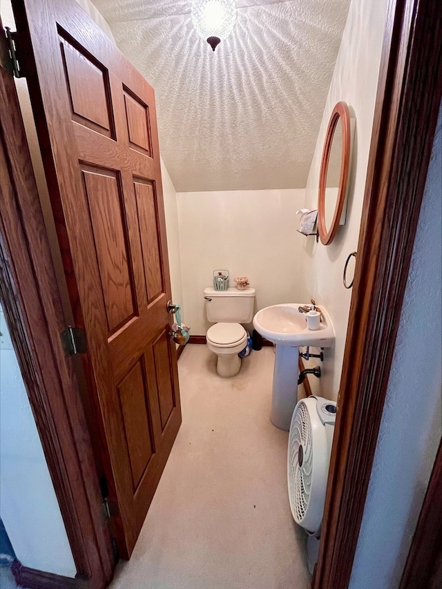 1116 E 2300 N Rd, Danforth, IL 60930 - half bathroom with toilet and a textured ceiling