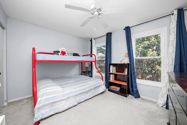 1140 Willoby Ln, Elgin, IL 60120 - carpeted bedroom featuring multiple windows and ceiling fan