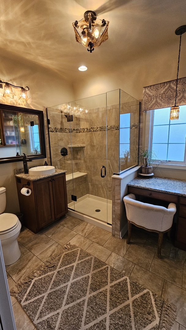 40752 N Grand Ave, Antioch, IL 60002 - full bath with vanity, a shower stall, and a chandelier