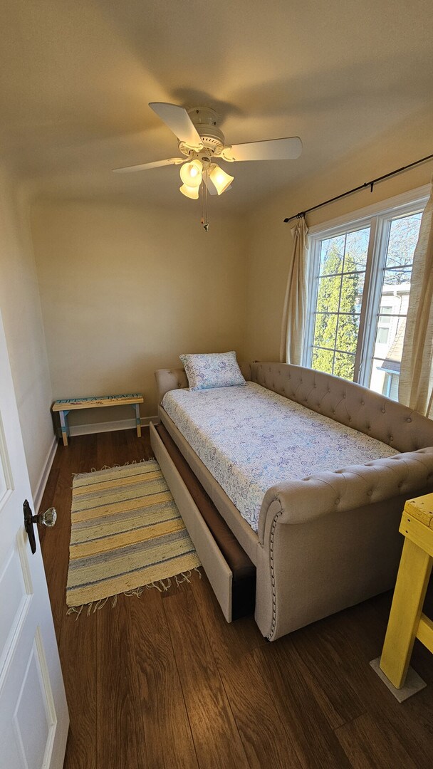 40752 N Grand Ave, Antioch, IL 60002 - bedroom featuring wood finished floors and a ceiling fan