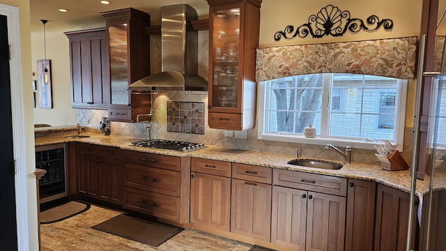40752 N Grand Ave, Antioch, IL 60002 - kitchen with wall chimney range hood, beverage cooler, stainless steel gas stovetop, glass insert cabinets, and light stone counters