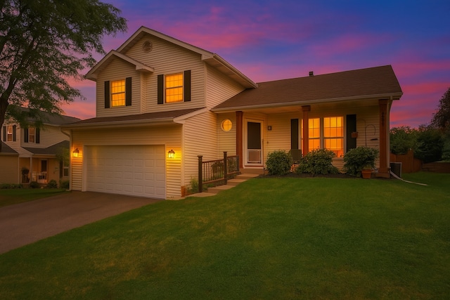 903 Pin Oak Cir, Cary, IL 60013 - view of front of home featuring concrete driveway, an attached garage, and a front lawn