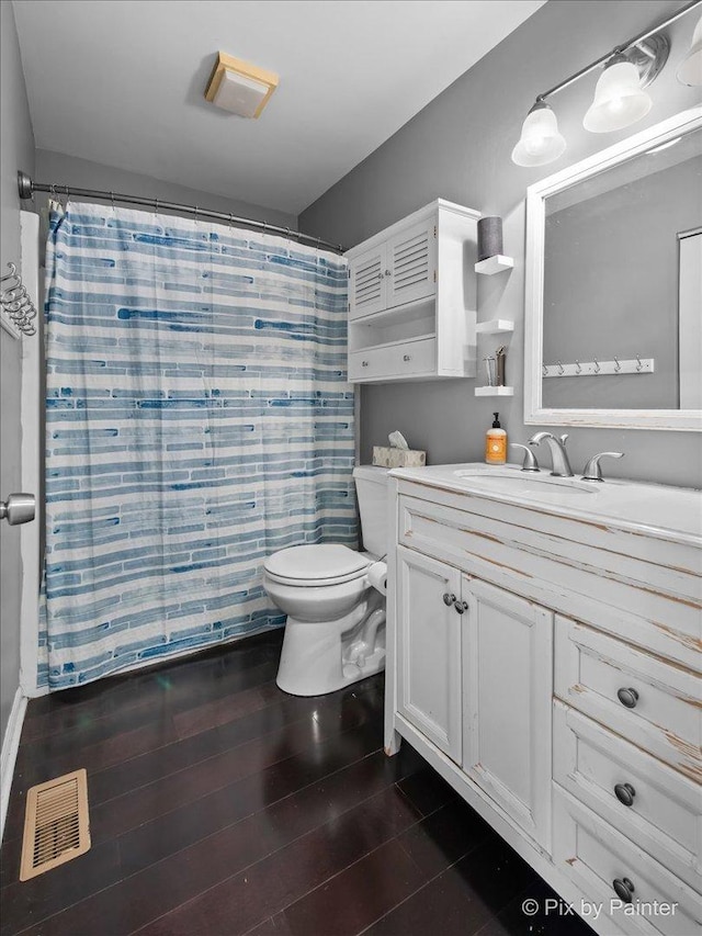 903 Pin Oak Cir, Cary, IL 60013 - bathroom featuring vanity, wood finished floors, and curtained shower