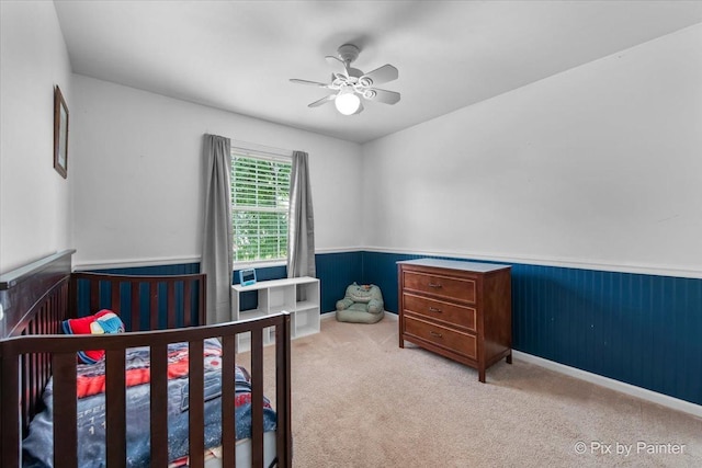 903 Pin Oak Cir, Cary, IL 60013 - carpeted bedroom with a wainscoted wall and ceiling fan