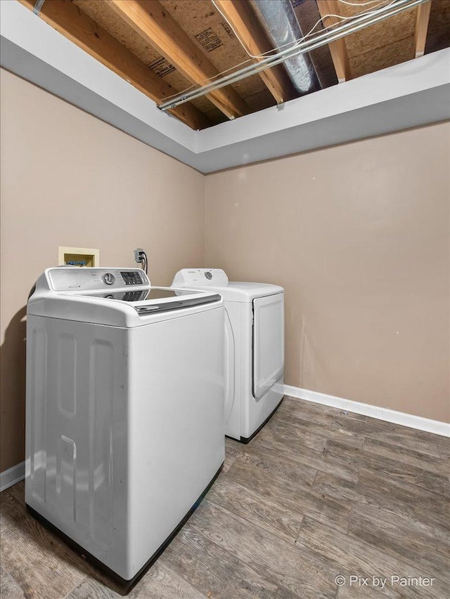 903 Pin Oak Cir, Cary, IL 60013 - washroom featuring washing machine and clothes dryer and wood finished floors