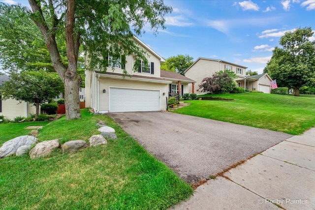 903 Pin Oak Cir, Cary, IL 60013 - traditional-style home featuring driveway, a garage, and a front lawn