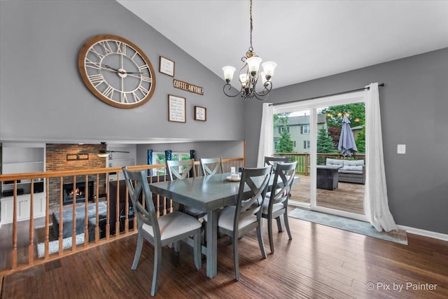 903 Pin Oak Cir, Cary, IL 60013 - dining room featuring a chandelier, wood finished floors, lofted ceiling, and ceiling fan