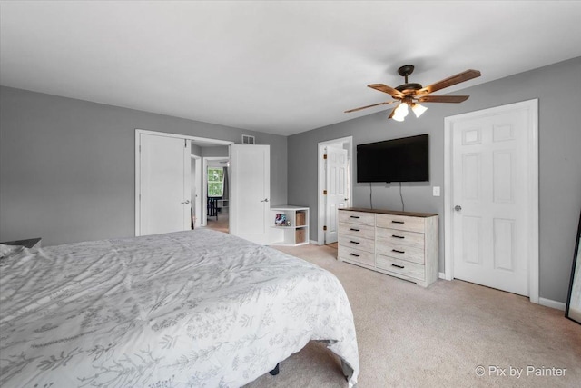 903 Pin Oak Cir, Cary, IL 60013 - bedroom with light carpet and ceiling fan
