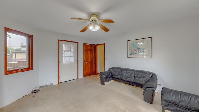 3354 N Overhill Ave, Chicago, IL 60634 - sitting room with a ceiling fan and carpet flooring