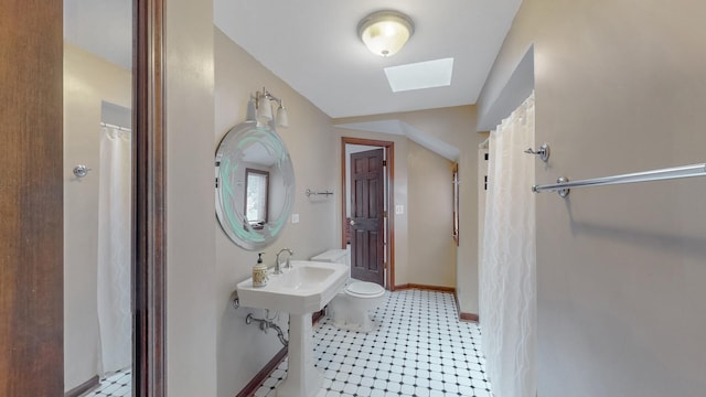3354 N Overhill Ave, Chicago, IL 60634 - bathroom with a skylight and a shower with shower curtain