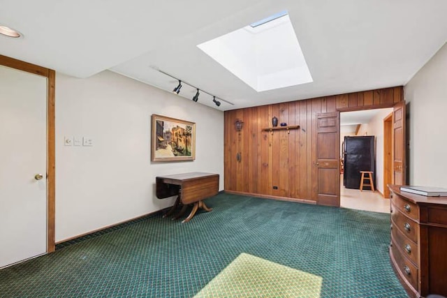7370 Forest Hill Rd, Burr Ridge, IL 60527 - office featuring a skylight, dark colored carpet, rail lighting, and wooden walls