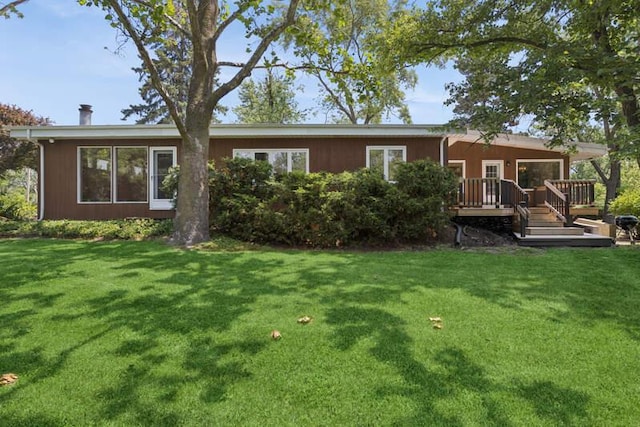 7370 Forest Hill Rd, Burr Ridge, IL 60527 - rear view of property with a deck and a lawn