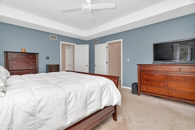2319 Hutchison Rd, Flossmoor, IL 60422 - bedroom with light carpet, a ceiling fan, and a tray ceiling