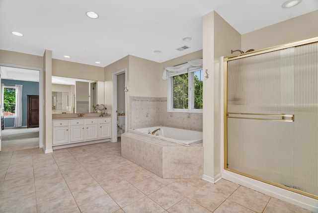2319 Hutchison Rd, Flossmoor, IL 60422 - full bath with vanity, a garden tub, a shower stall, tile patterned floors, and recessed lighting