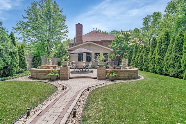 2319 Hutchison Rd, Flossmoor, IL 60422 - view of yard featuring a patio