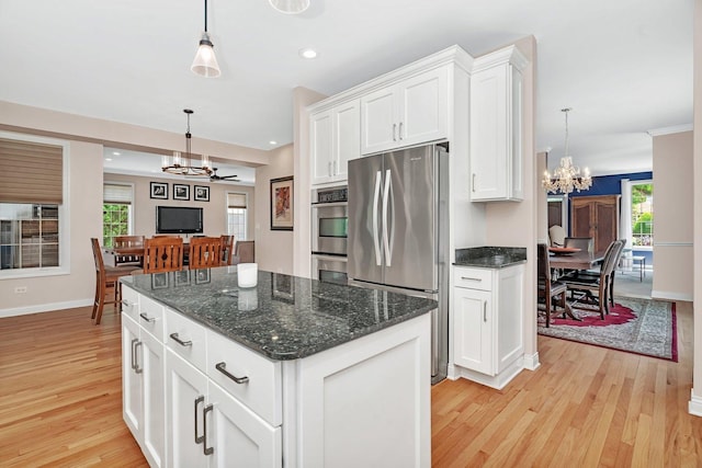 2319 Hutchison Rd, Flossmoor, IL 60422 - kitchen featuring stainless steel appliances, a chandelier, light wood-style floors, plenty of natural light, and recessed lighting