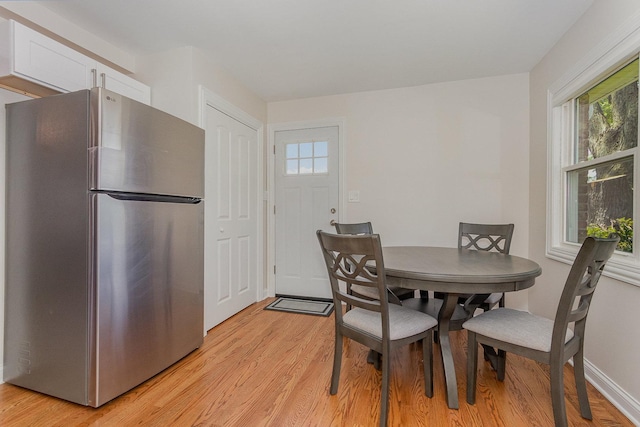 8954 Southfield Dr, Bridgeview, IL 60455 - dining room featuring plenty of natural light and light wood-type flooring