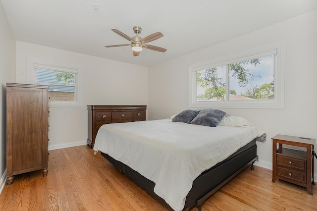8954 Southfield Dr, Bridgeview, IL 60455 - bedroom featuring light wood finished floors and ceiling fan