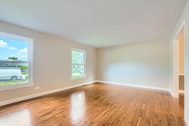 918 Carol Ln, Crete, IL 60417 - spare room featuring wood finished floors