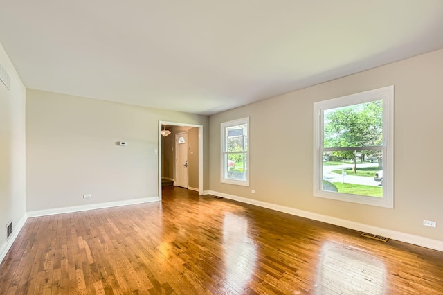 918 Carol Ln, Crete, IL 60417 - empty room with hardwood / wood-style floors and baseboards