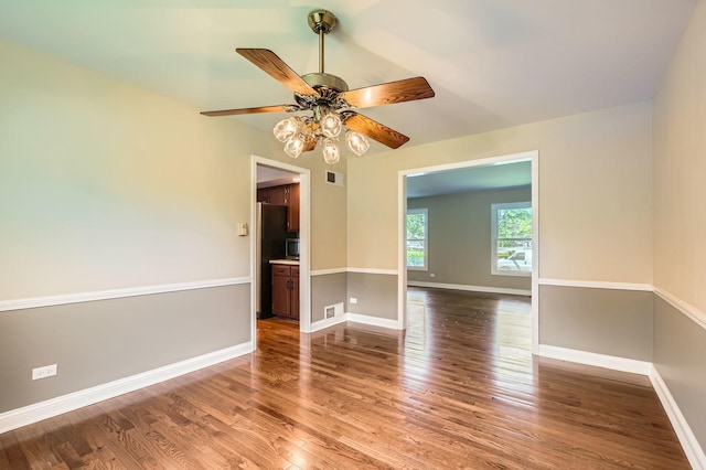 918 Carol Ln, Crete, IL 60417 - unfurnished room featuring wood finished floors and a ceiling fan