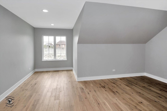 16451 Kayla Dr, Lemont, IL 60439 - additional living space featuring light wood-style flooring and recessed lighting